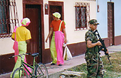 Clowns, candy, and a call for children's cooperation from the Colombian army. Photo: Garry Leech