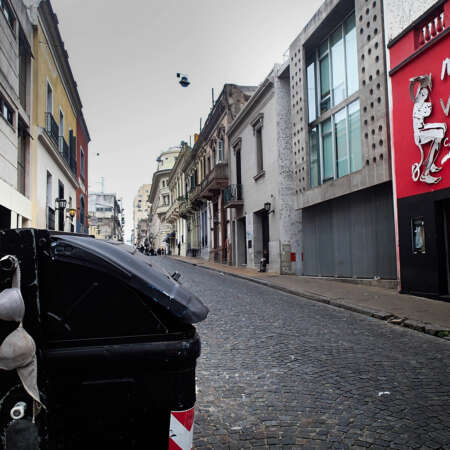 <p>A street in San Telmo wakes up with a bit of a hangover.</p>