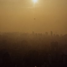 <p>A helicopter whisks a VIP over the endless skyline of São Paulo during one of its whiskey-hued afternoons. There's no place quite like this city.</p>