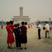 <p>A family poses for a portrait in Tiananmen Square. </p>