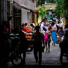 <p>A bustling market in a Guangzhou alley.</p>