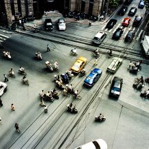 <p>People and vehicles negotiate the quasi-controlled chaos of a broad intersection in Shanghai.<br /></p>