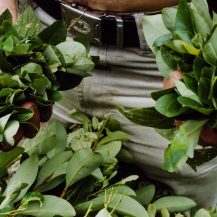 <p>A razpachin (coca plucker) holds handfuls of the innocuous leaves that, after several steps of processing, can become cocaine.</p>