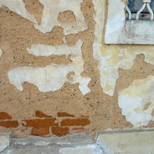 <p>Layers of facade gradually eroding from a building in Prague.<br /></p>