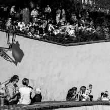 <p>People gather on the tiered walls below Prague Castle to take in the view back over the city.</p>