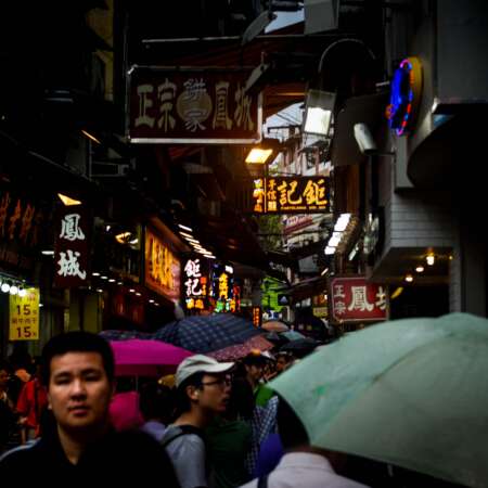 <p>A crowded shopping street in Macao.</p>