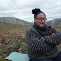<p>Portrait of Dave at campsite after a day's hike.</p>