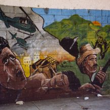 <p>A mural in San Salvador depicts the suffering and scale of the 1979-1992 civil war that had concluded in a peace agreement just a few years earlier.</p>