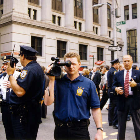 <p>The NYPD blue are quick to turn out in defence of the white collars of Wall Street. Here, police film, observe, and later arrest peaceful protestors outside the doors of the New York Stock Exchange.</p>