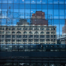 <p>The subway and some skyline reflect in the mirrored windows of new office blocks in Queensboro Plaza.</p>