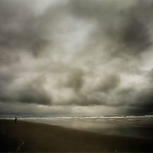 <p>A solitary figure at a beach on the Oregon coast. <br /></p>