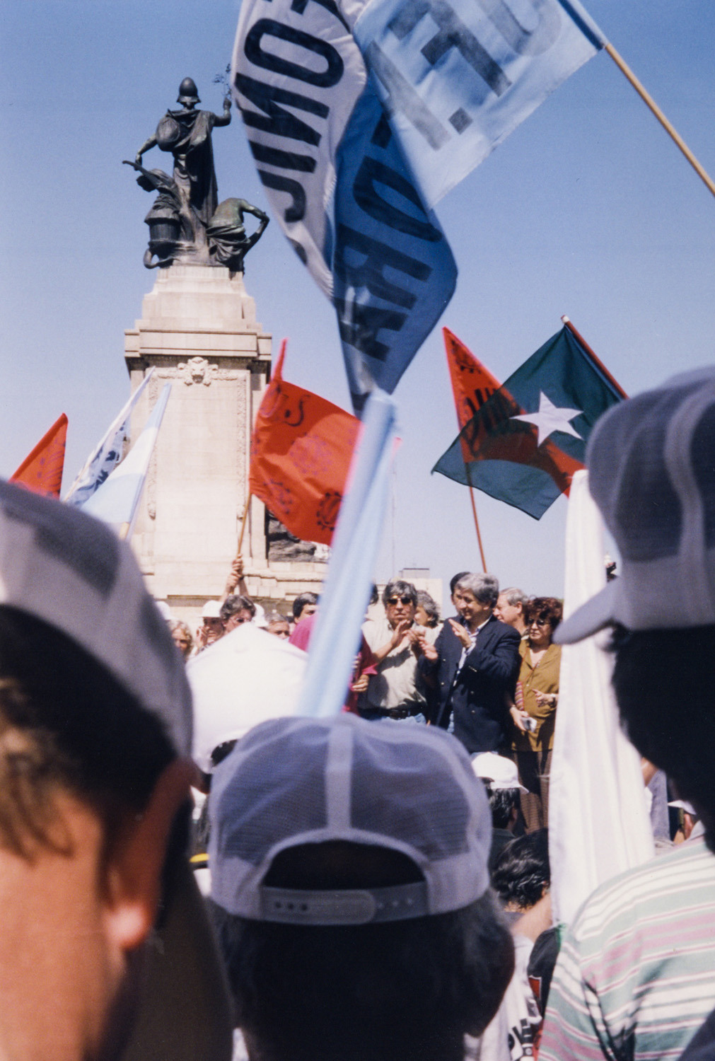 <p>Argentine trade unionists rally amid a forest of flags at the Plaza del Congreso. </p>