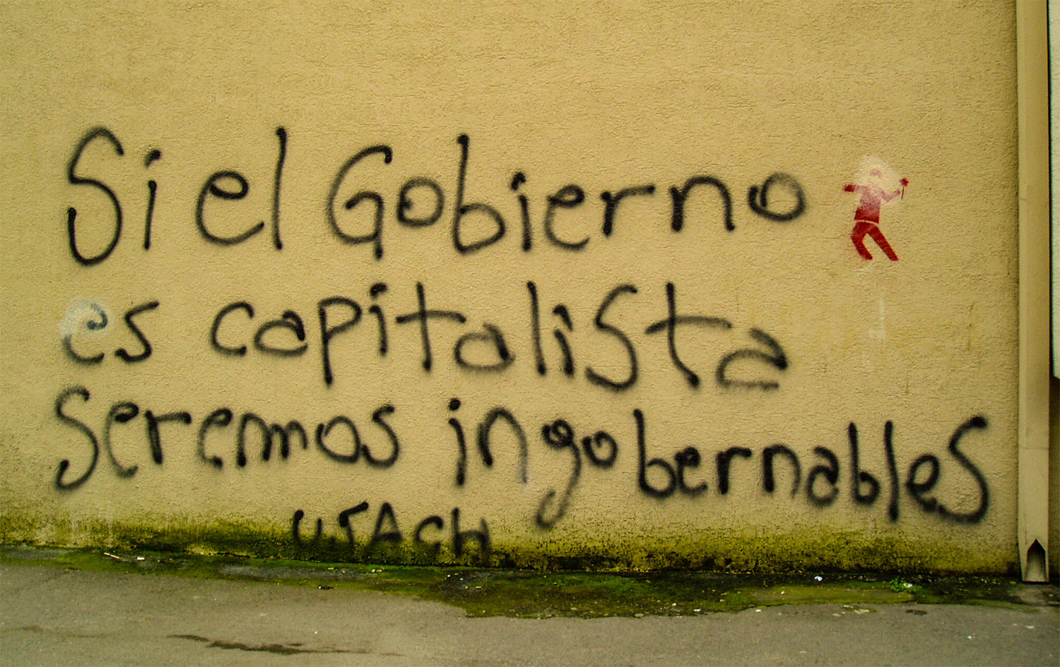 <p>A stark warning on a wall in Santiago: 'If the government is capitalist, we will be ungovernable'.</p>