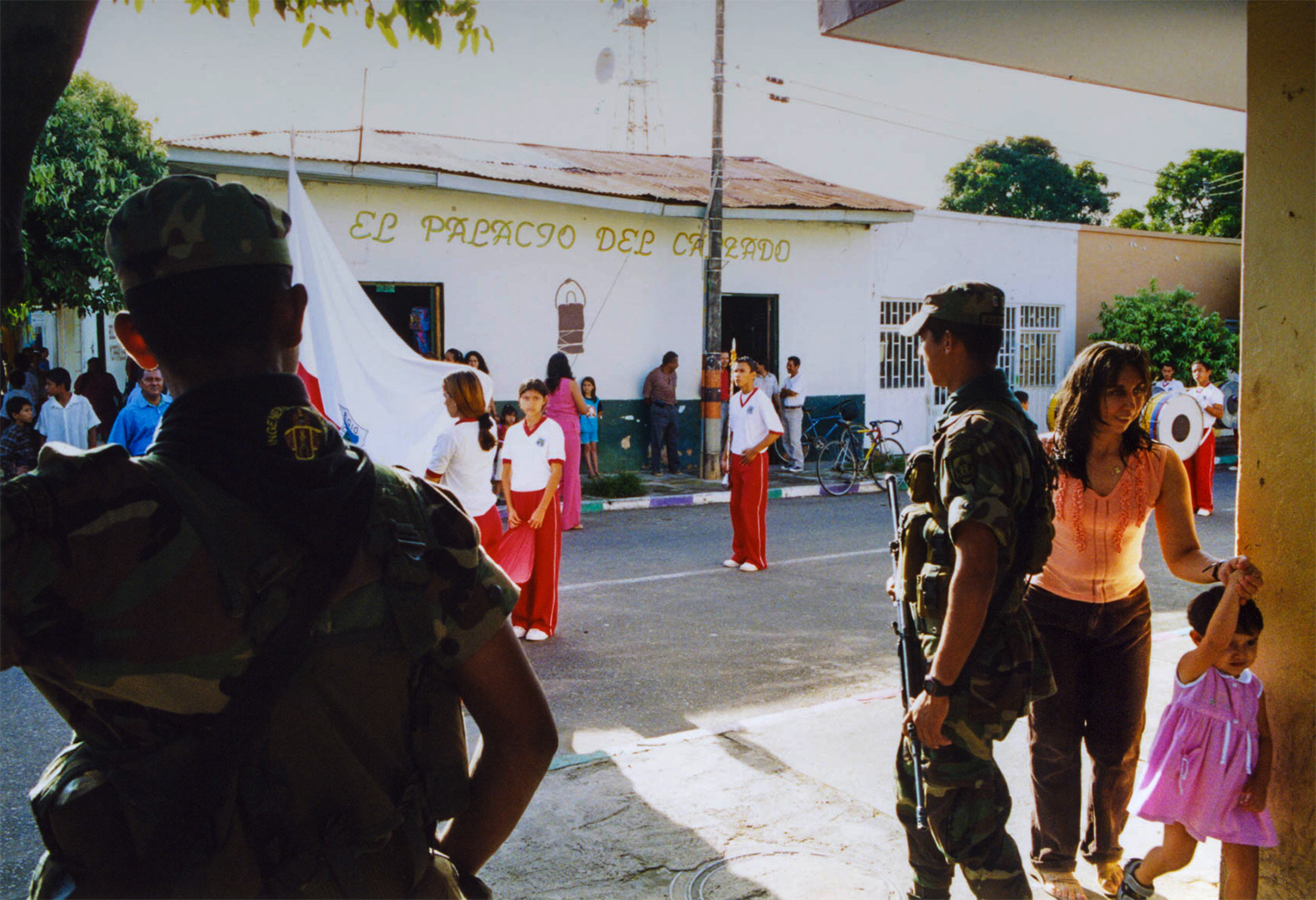 <p>Soldiers secure a parade in Tame, a rural town rocked by the violence of Colombia's civil war. </p>