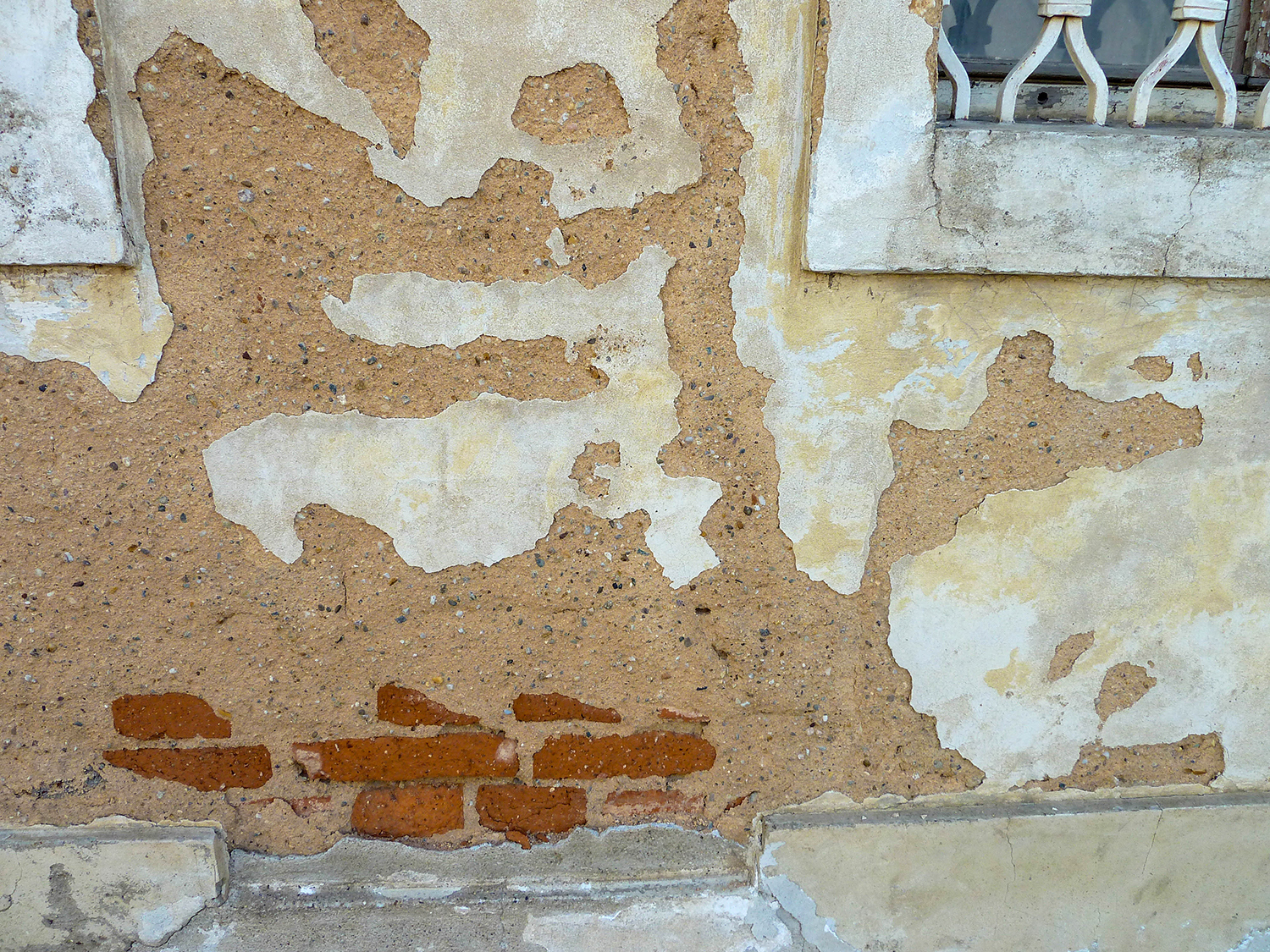 <p>Layers of facade gradually eroding from a building in Prague.<br /></p>