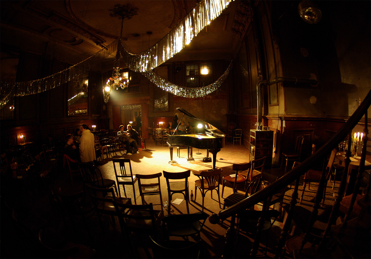 <p>The warm and well-worn interior of the Spiegelsaal at Clärchens Ballhaus, a beloved venue in Berlin.</p>