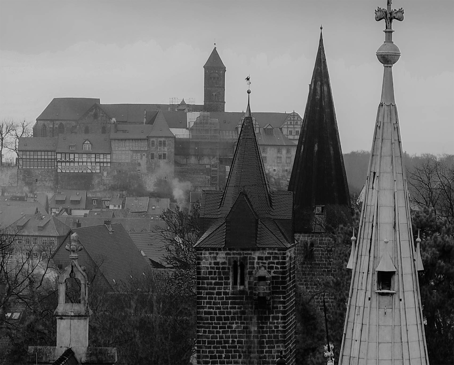 <p>A view of spires and towers in Quedlinburg on a winter's day.</p>