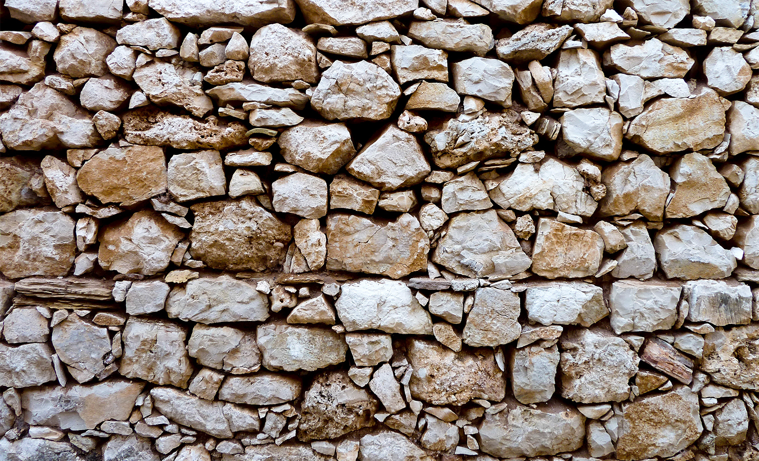 <p>A limestone wall bakes in the Adriatic sun of Corfu.</p>