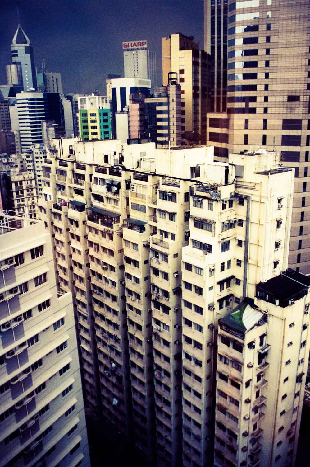 <p>A view of Wan Chai's verticality with the Wing Tak blocks on Bowrington Road front and centre, and more towers beyond in Causeway Bay.</p>