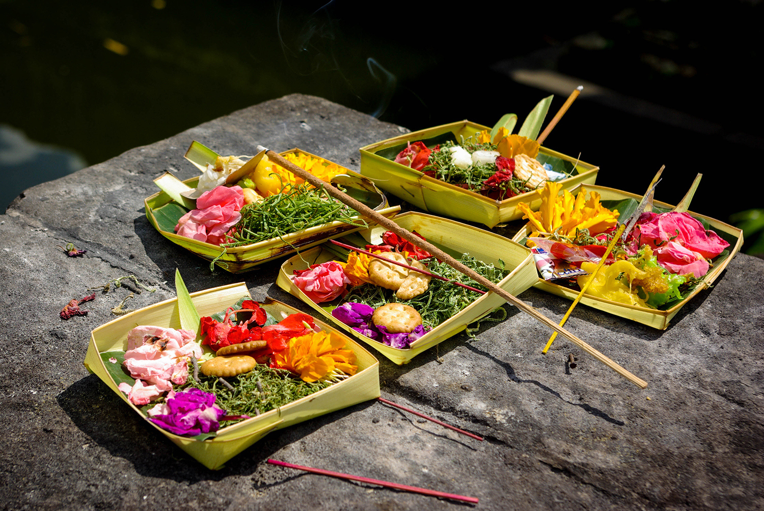 <p>Balinese Hindus create these colourful <em>canang sari</em> baskets from palm leaves. They are left at temples, in front of homes, and in many other places as daily offerings.</p>