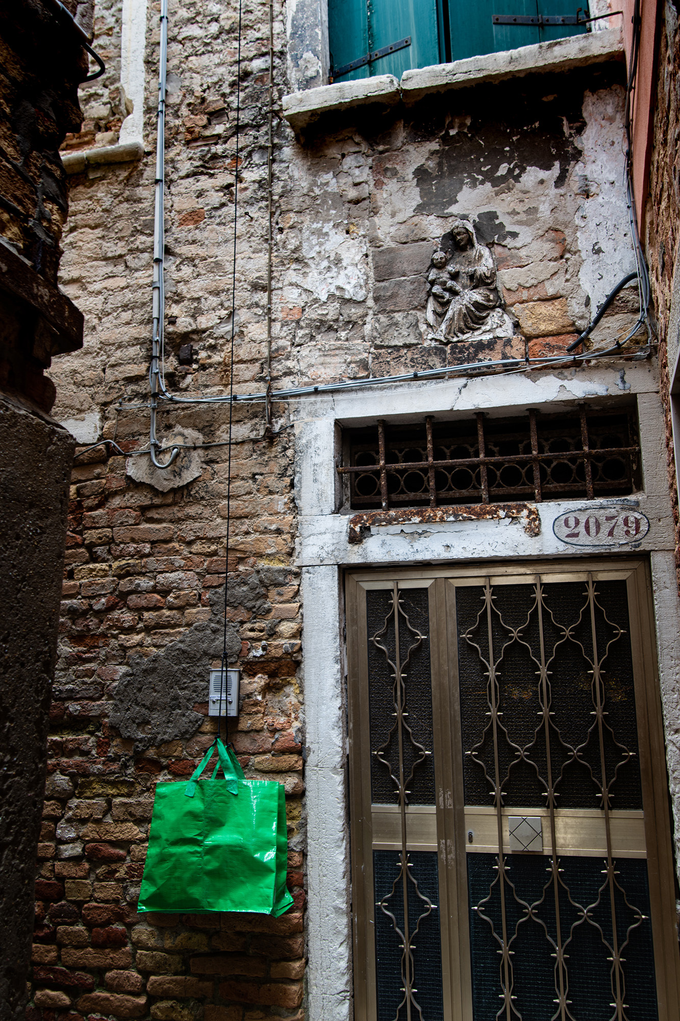 <p>Details of a doorway on Calle del Forno, one of Venice's numerous alleys.</p>