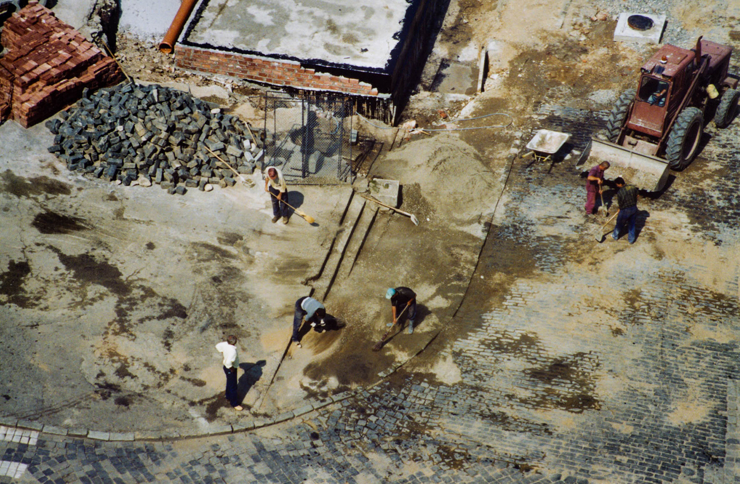 <p>Workers laying cobbles in Sibiu. </p>