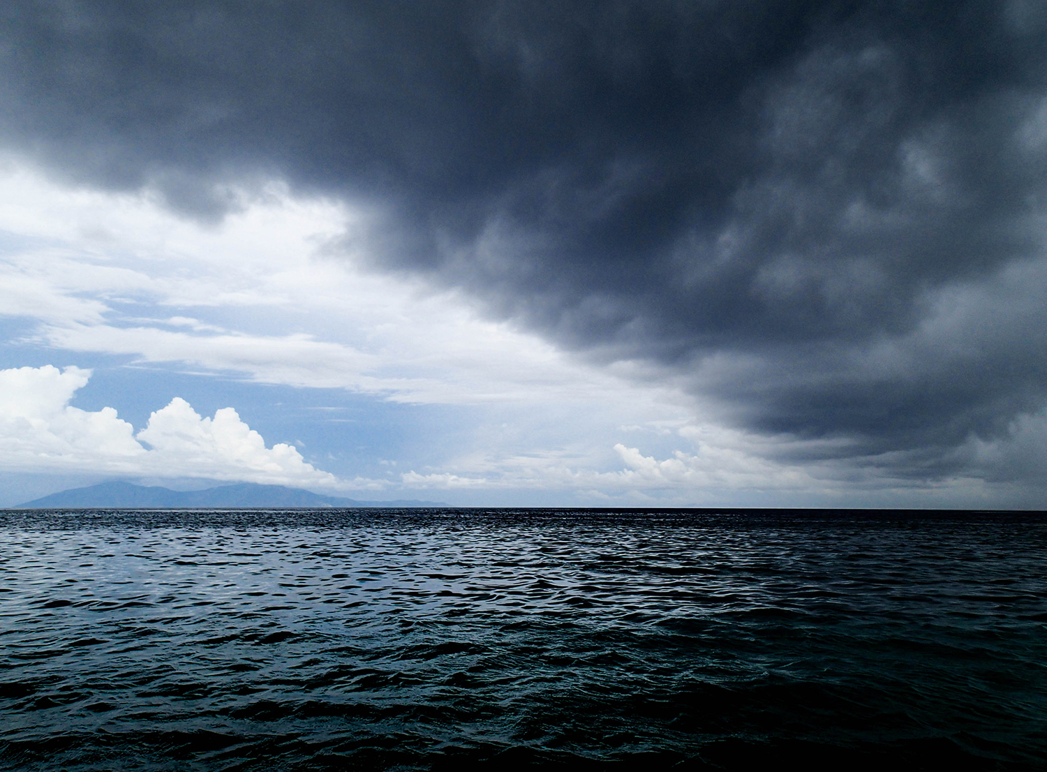 <p>Timor-Leste's rainy season delivers another dramatic sky out of the blue, this time at Jesus Backside Beach – so named for being behind the large statue of Christ that overlooks Dili's seafront. These clouds emerged suddenly and with tremendous rain moments later, before dissipating just as quickly as they'd arrived.</p>