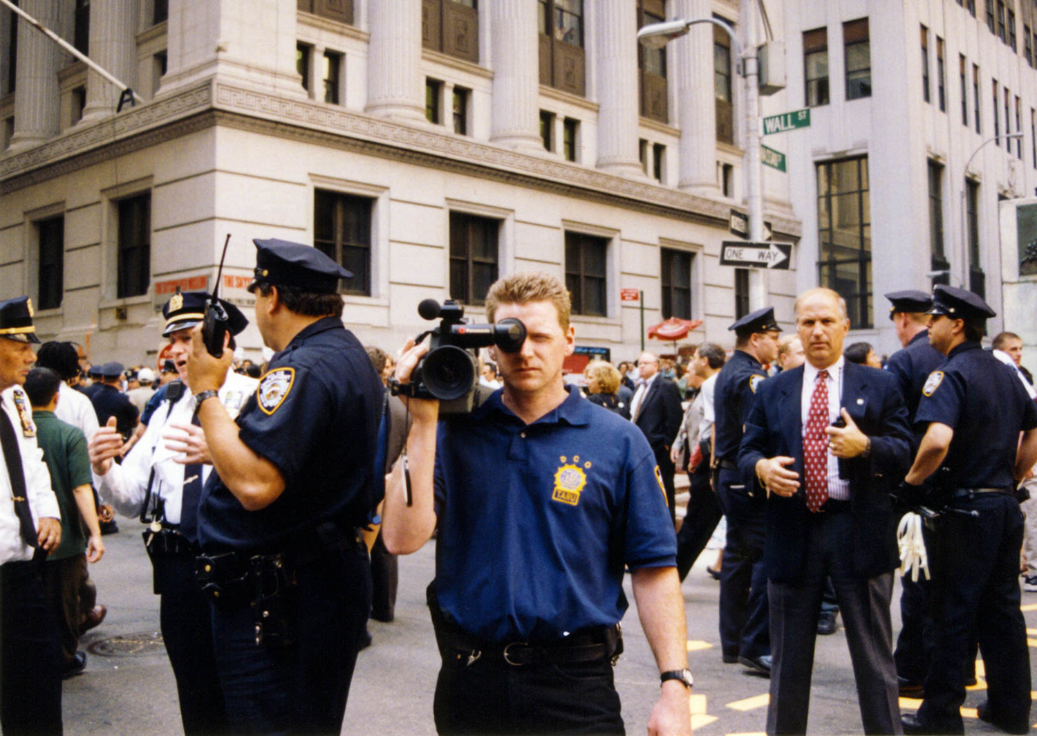 <p>The NYPD blue are quick to turn out in defence of the white collars of Wall Street. Here, police film, observe, and later arrest peaceful protestors outside the doors of the New York Stock Exchange.</p>