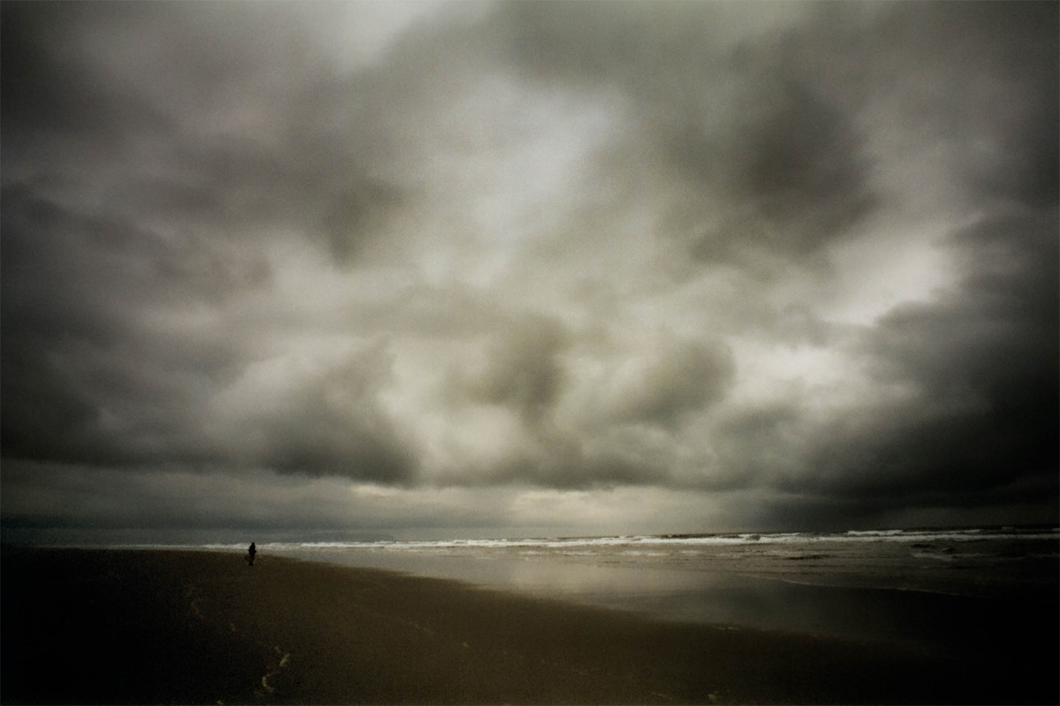 <p>A solitary figure at a beach on the Oregon coast. <br /></p>