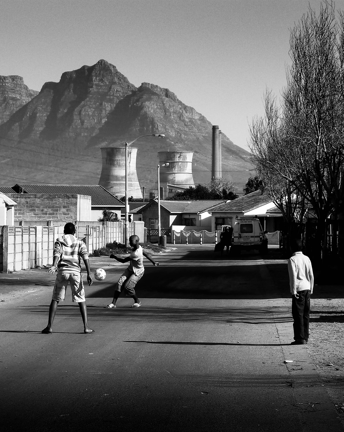<p>Friends playing football in the streets of Langa.</p>